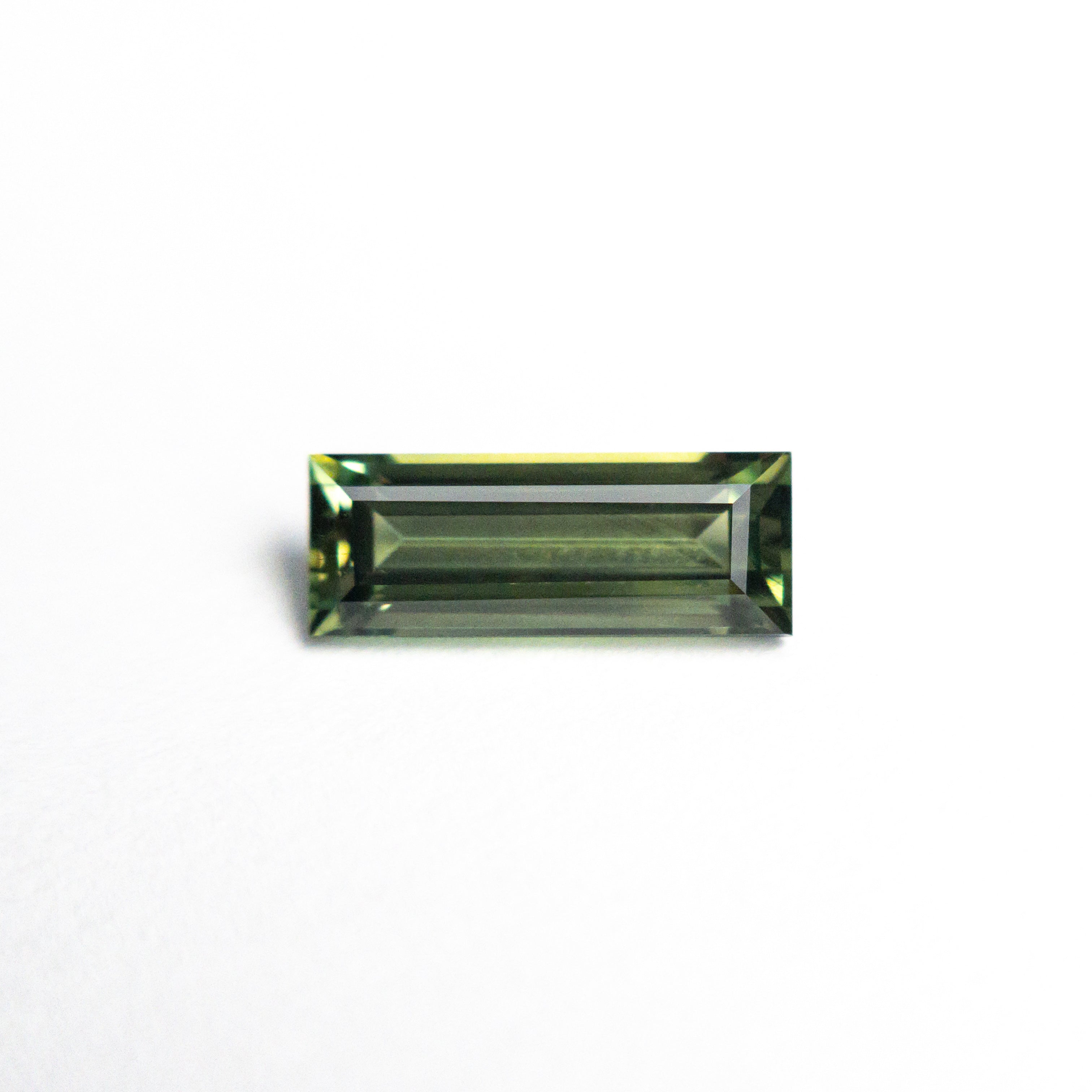 0.85ct 8.45x3.22x2.61mm Rectangle Step Cut Sapphire 25740-03