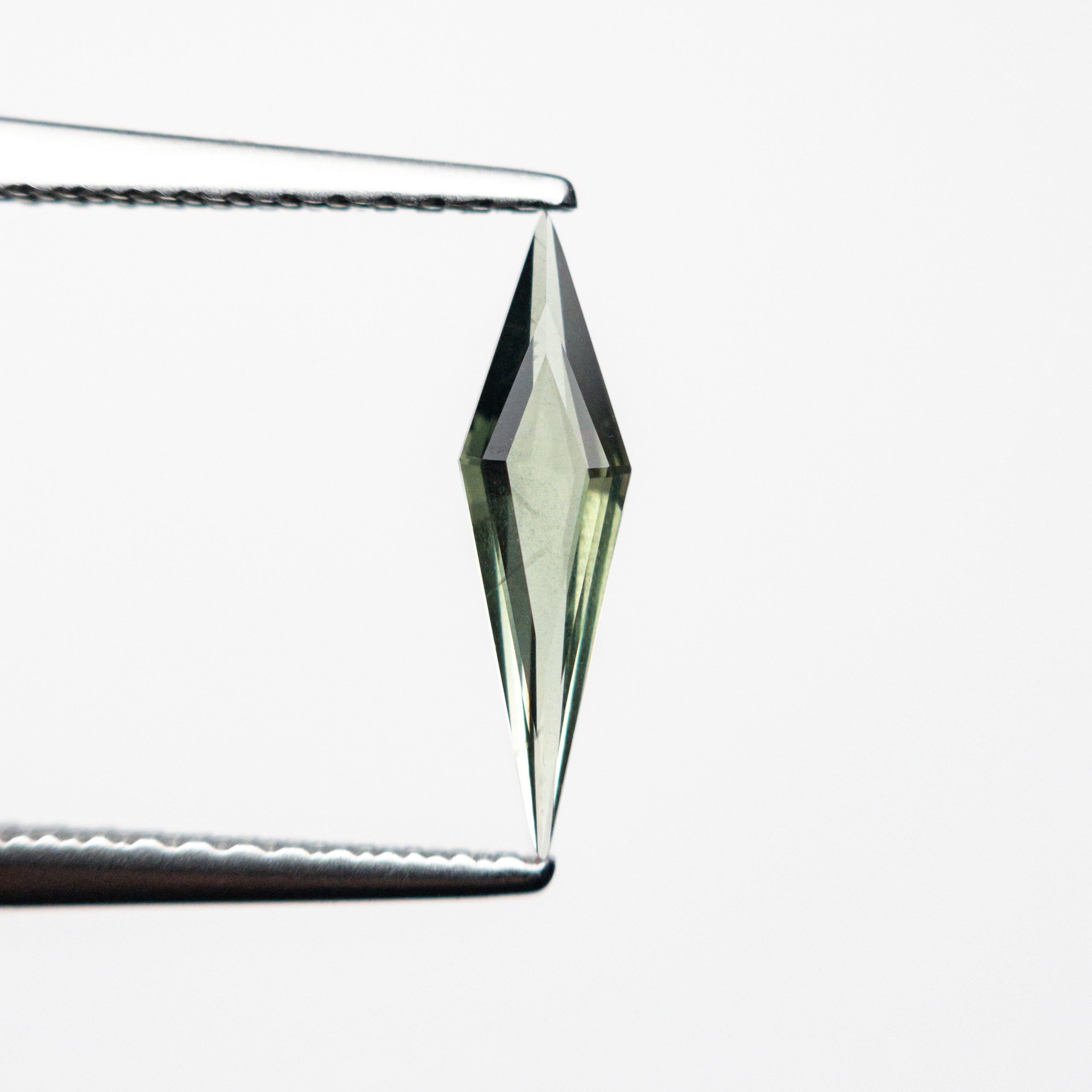 0.35ct 11.64x3.08x1.53mm Kite Step Cut Sapphire 25740-16