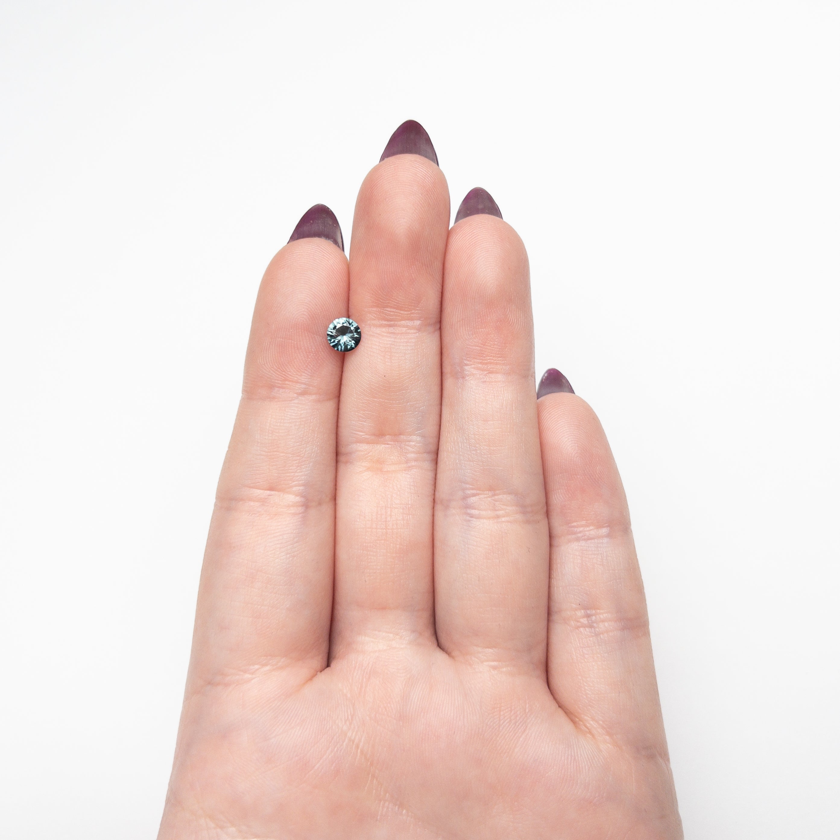0.63ct 5.5.28x5.27x3.12mm Round Brilliant Sapphire 26526-10