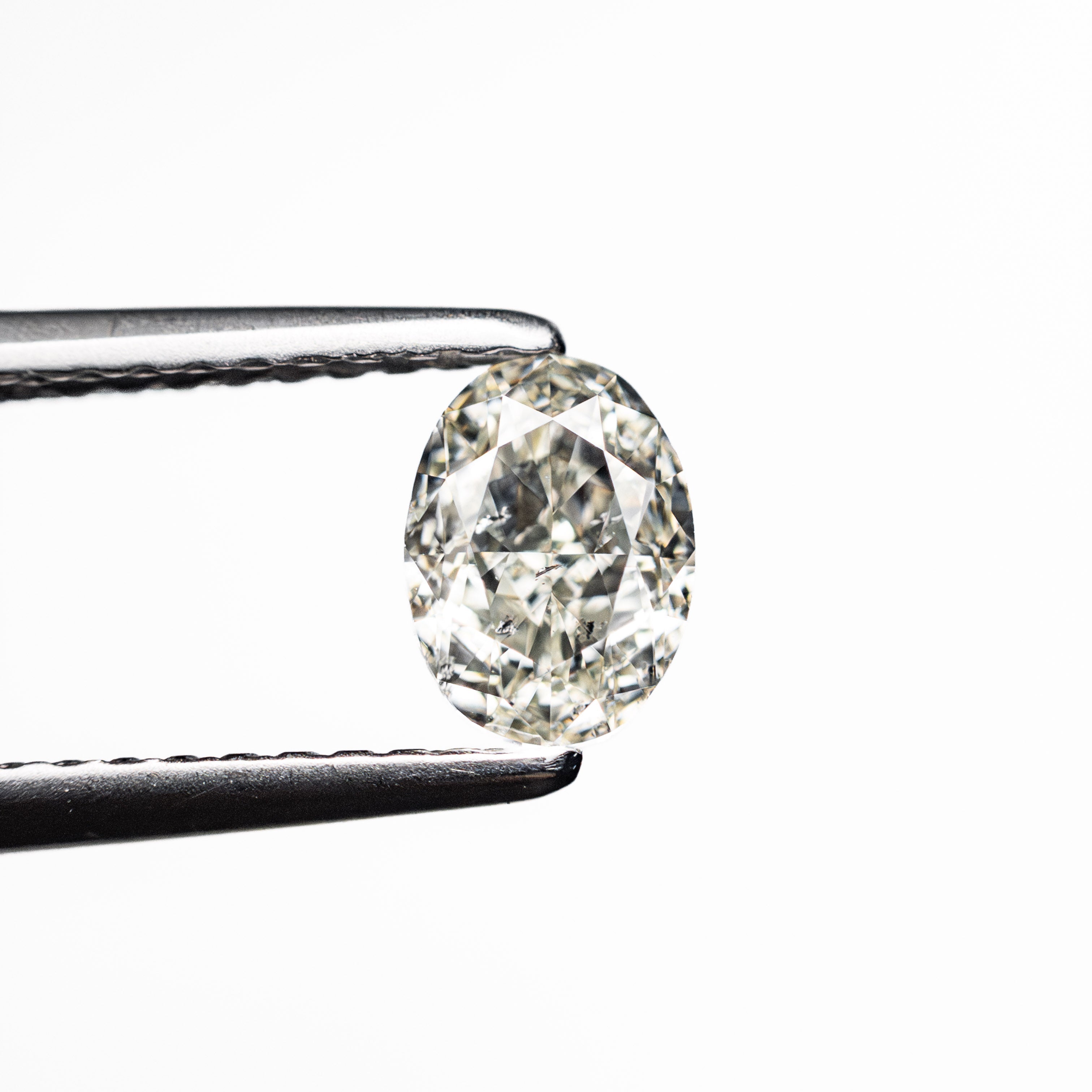 0.70ct 6.09x4.50x3.04mm SI2 K Oval Brilliant 27065-05