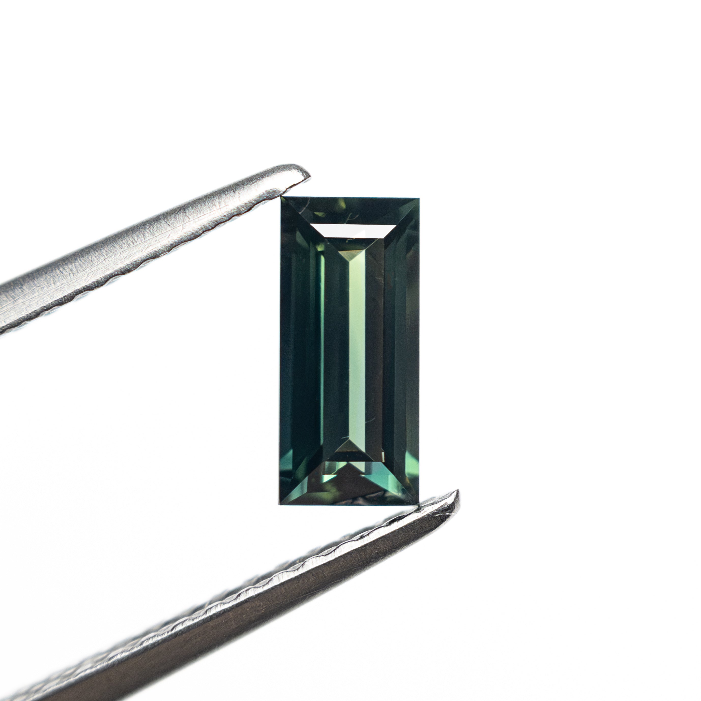 0.71ct 7.14x3.43x2.45mm Rectangle Step Cut Sapphire 27336-46