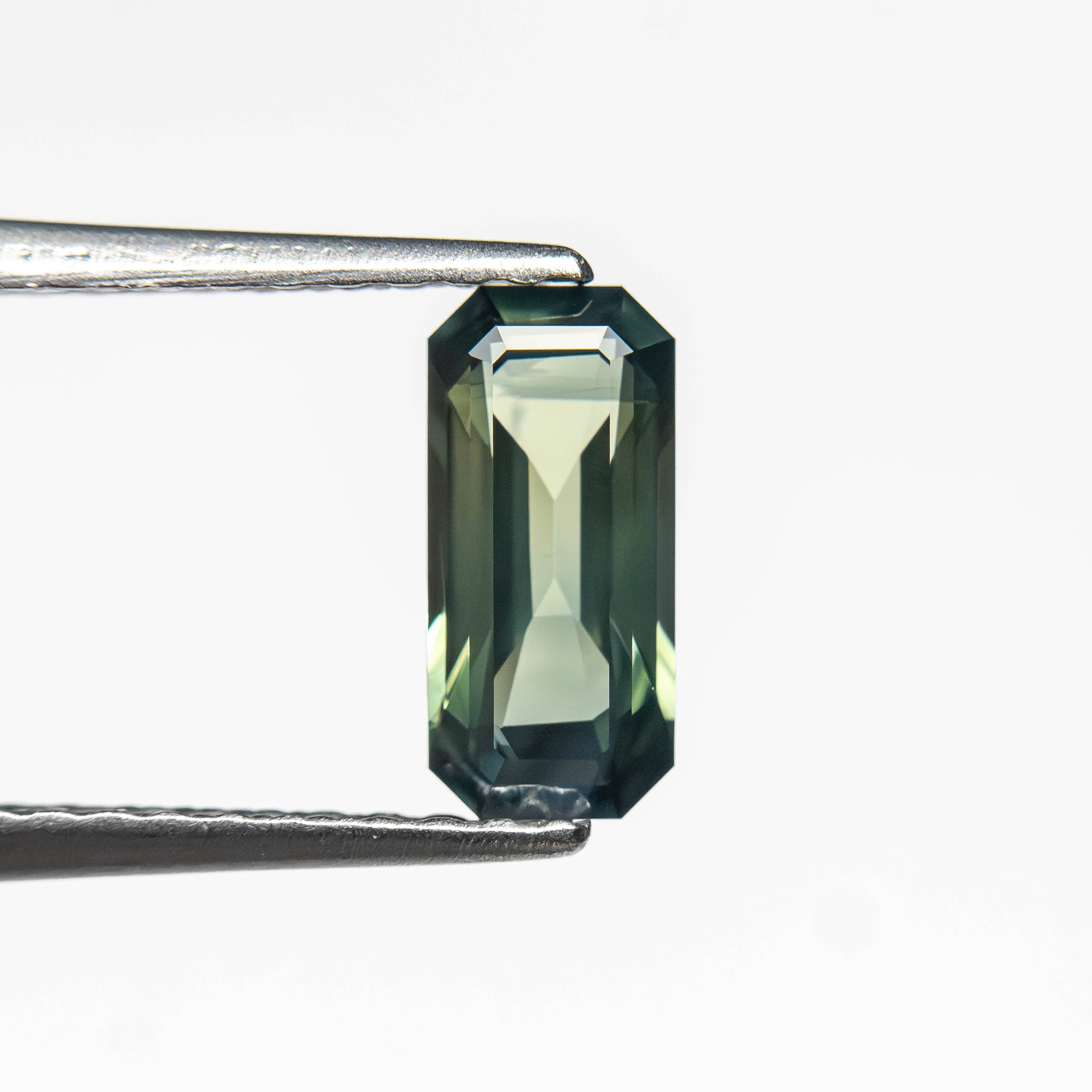 0.71ct 7.78x3.64x2.46mm Cut Corner Rectangle Step Cut Sapphire 27336-53