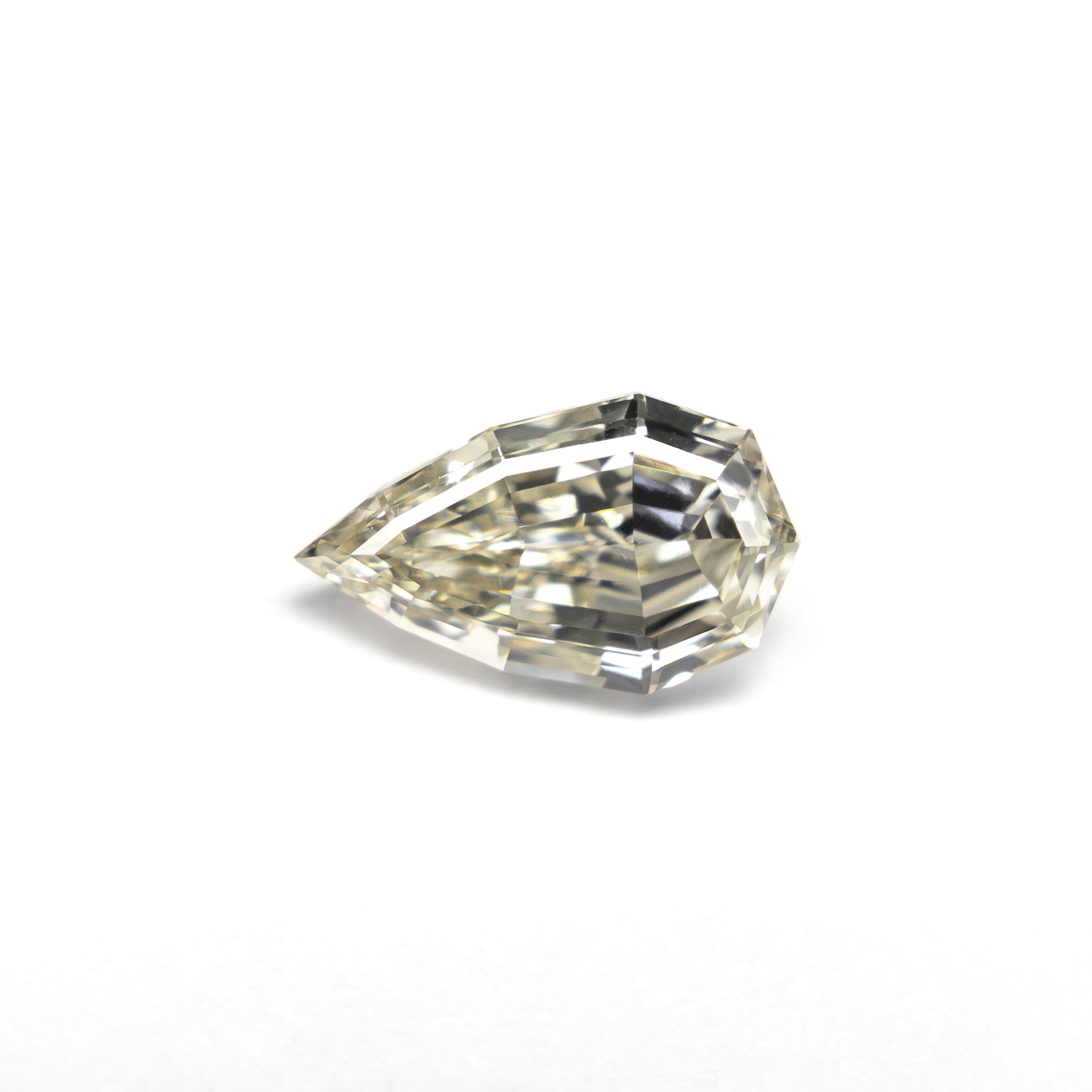 0.71ct 7.85x4.68x2.90mm VVS2 Q-R Geo Pear Step Cut 🇿🇦 27364-15