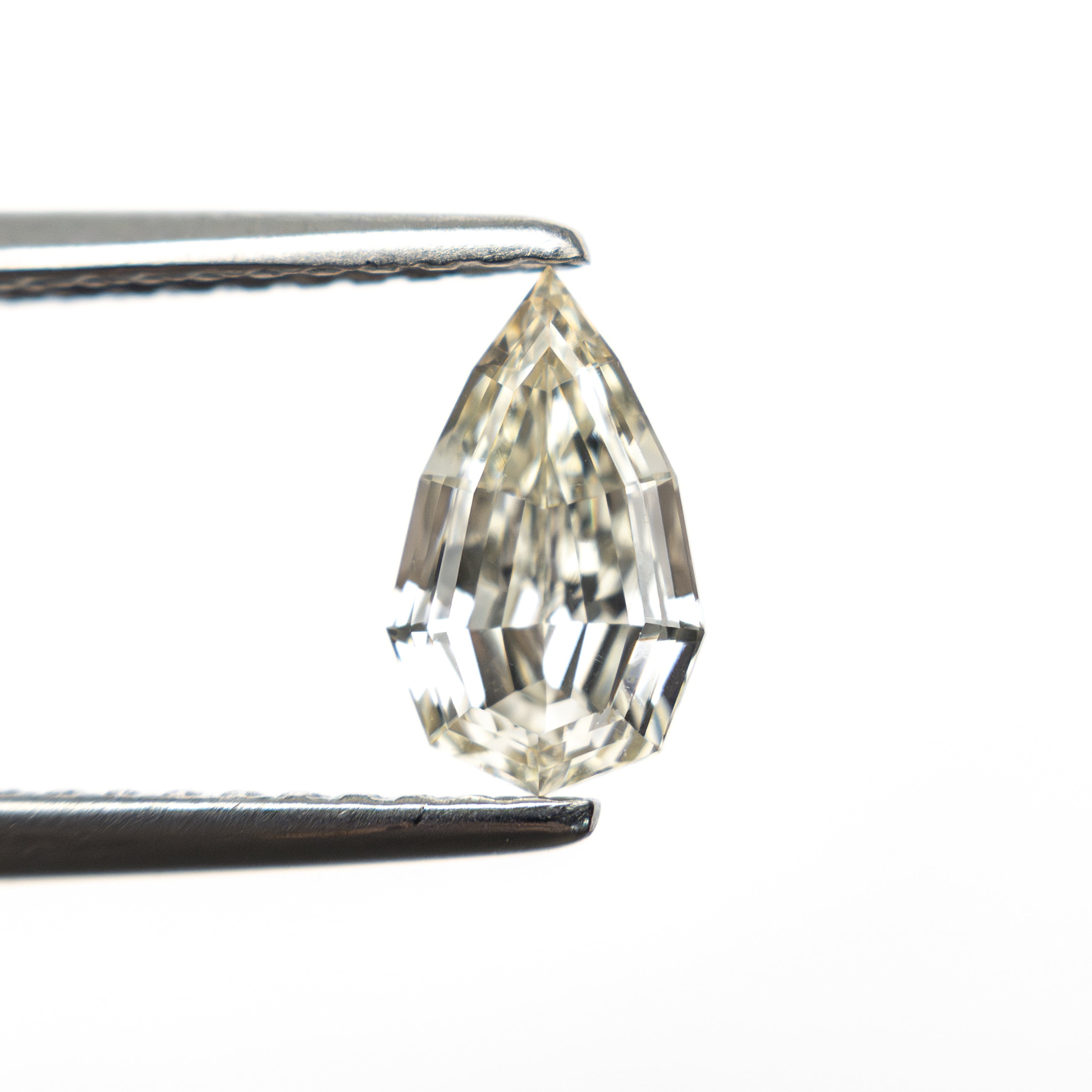 0.71ct 7.85x4.68x2.90mm VVS2 Q-R Geo Pear Step Cut 🇿🇦 27364-15