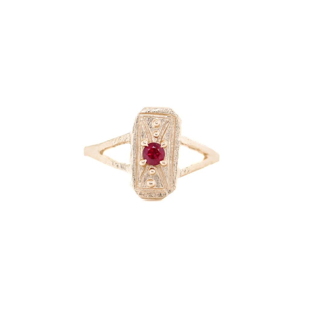 ruby mini shield ring in 18kt yellow gold by universal deco